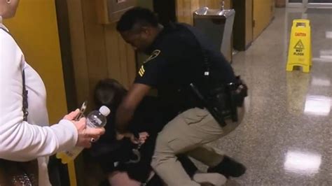 teacher handcuffed at school board meeting appalled that her voice was silenced abc news