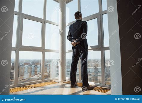 A Man In Suite At The Window Stock Photo Image Of Away Ethnicity