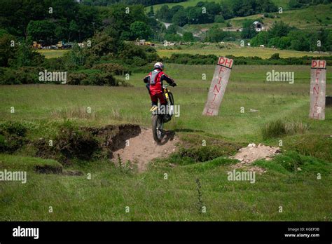 Motorcross Bike Rider On A Finish Line Of A Cross Trail Showing Of