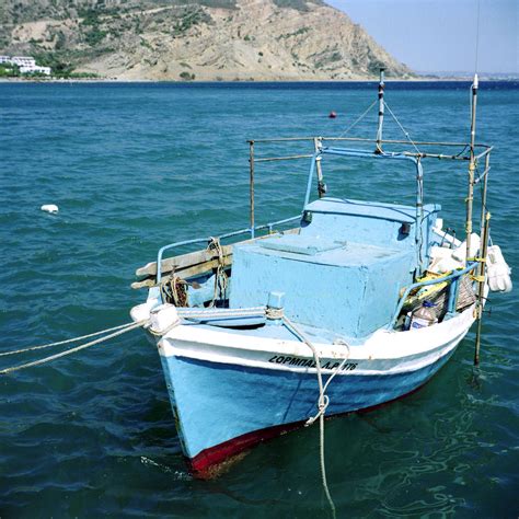 Greek Fishing Boat Photograph By Paul Cowan Fine Art America