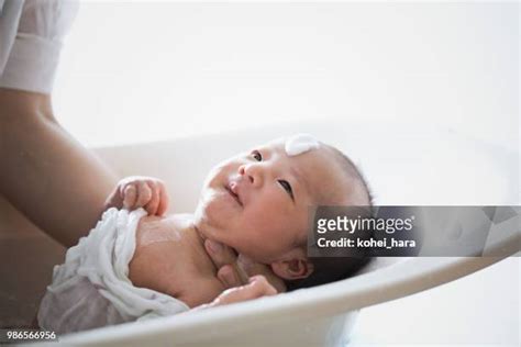 Asian Mom Bath Photos And Premium High Res Pictures Getty Images