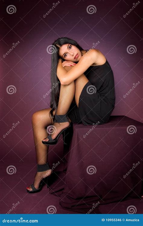 Beautiful Brunette Girl In Black Dress Posing In Stock Photo Image Of