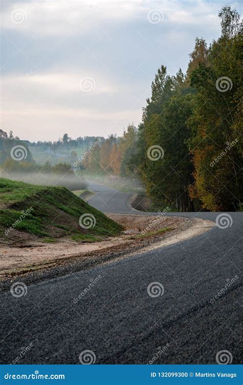 Foggy Country Road In Autumn With Mist And Asphalt Stock Photo Image