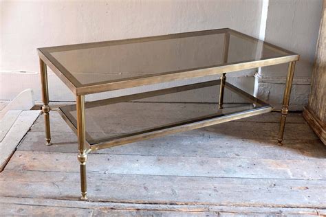 Anyway, the sofa, which is (hopefully) a mix of very elegant and very comfortable charcoal velvet with a button back (but not a chesterfield) and a highish leg (so there will need to be hoovering) has started me thinking about coffee tables. 37 Best Antique Brass Glass Coffee Tables
