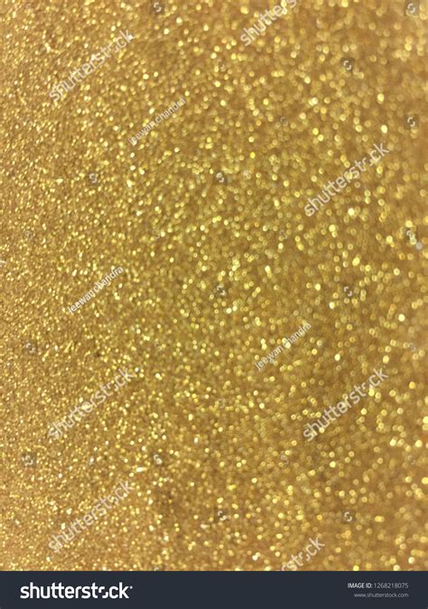 Glitter Background With Shiny Sparkles And Gold Colors Vector Shiny