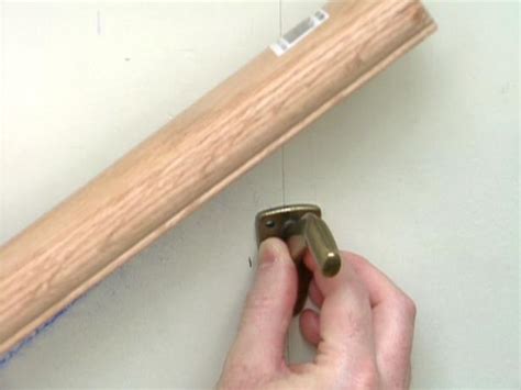Use the handrail layout line and the face of the knee wall to determine the length of the newel post. How to Install a Stairway Handrail | how-tos | DIY
