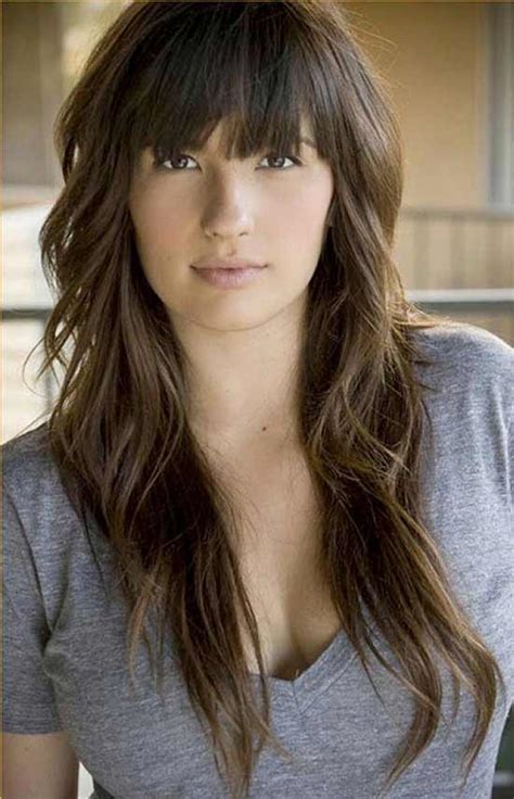 For short hair, use layers to create volume and bangs for sassy style. 20 Cute Long Layered Haircuts With Bangs To Make You Look ...
