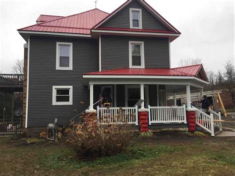They also suggest some great color combinations for siding based on your existing roof colors. siding and roof color | Red roof house, Red roof