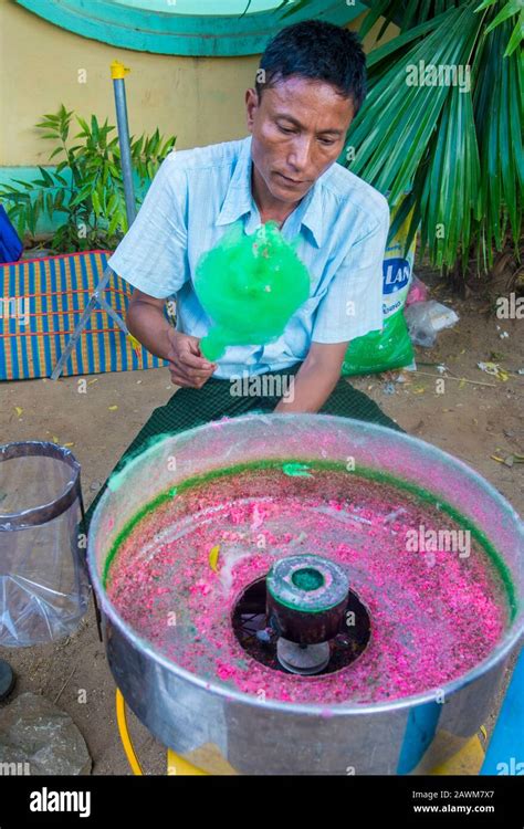 Burmese Man Selling Cotton Candy In A Market In Shan State Myanmar