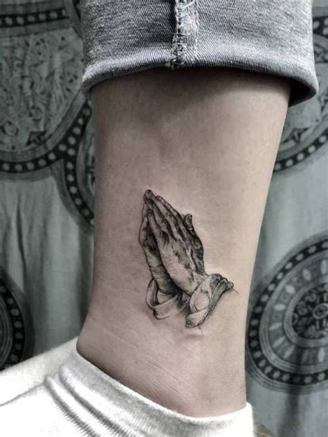 A Woman S Ankle With A Small Praying Hand Tattoo On Her Left Side Ribcage