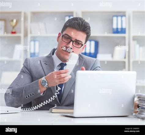 The Businessman Smoking In Office At Work Stock Photo Alamy