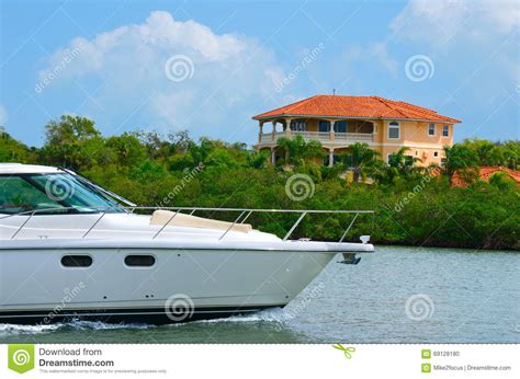 Cruising Yacht Bow With Mansion In Background Stock Photo Image Of