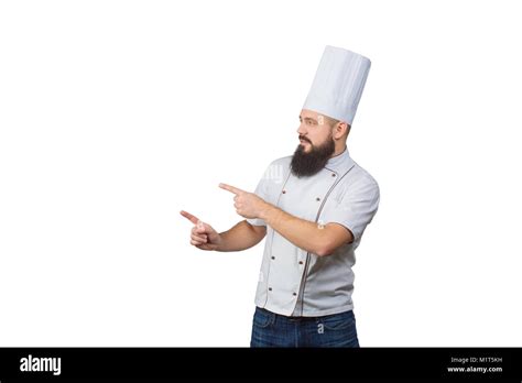 Charmante Junge Männliche Küchenchef Pointing Finger In Weiße Uniform