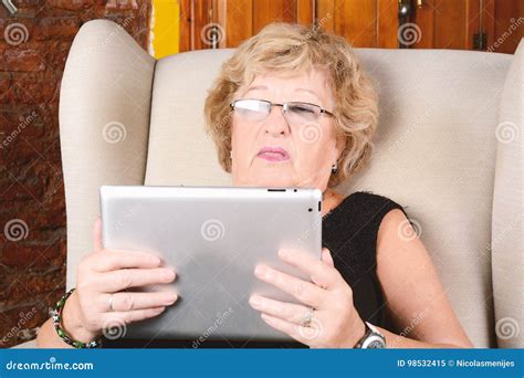 Old Woman Using Tablet Stock Image Image Of Cheerful 98532415