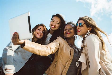 Friends Taking A Selfie By Stocksy Contributor Simone Wave Stocksy