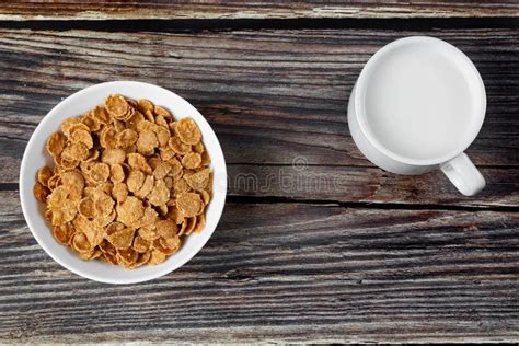 White Plate With Healthy Cereal Breakfast And Cup Of Milk Stock Image