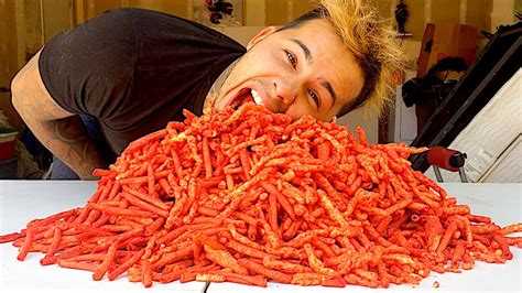Maybe you would like to learn more about one of these? HOT CHEETOS & TAKIS CHALLENGE (100 Bags) - YouTube