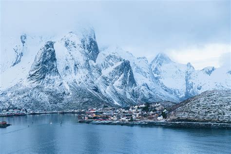 Snow Capped Mountains Reine Lofoten Norway Digital Art By Pete Saloutos