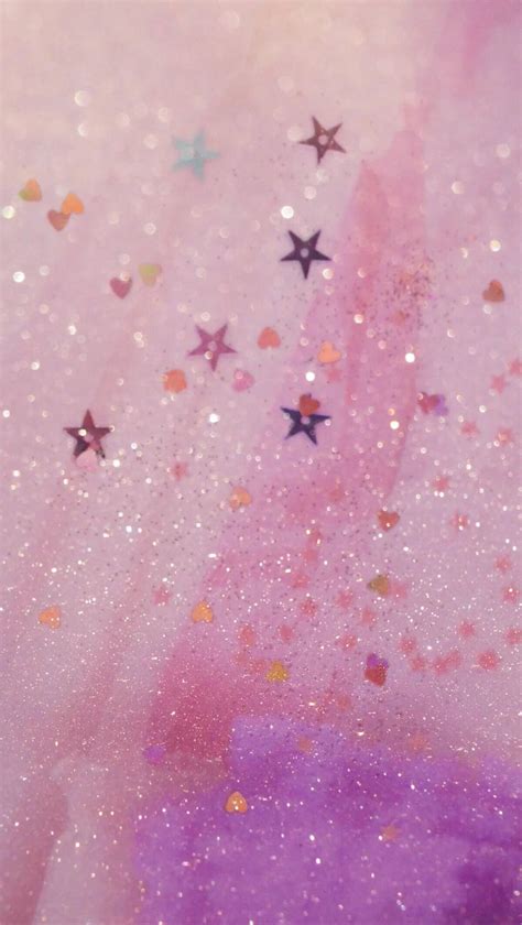 Stars Are Falling From The Sky In Front Of Pink And Purple Background