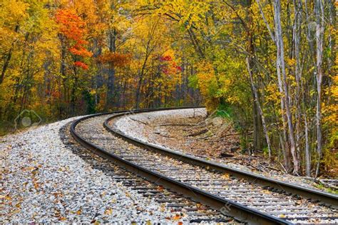 Railroad Track Curve Around The Bend And Out Of Sight Through Stock
