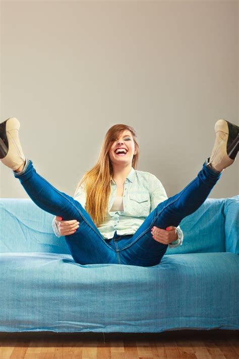 Fashionable Girl Wearing Denim Sitting On Couch Stock Image Image Of Rest Jeans 57335115