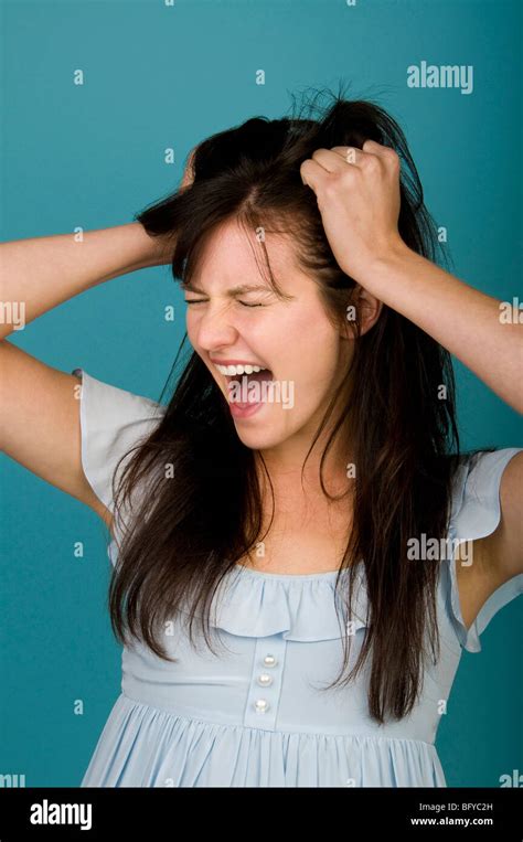 Woman Screaming And Pulling Hair Stock Photo Alamy