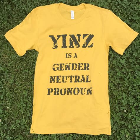 yinz is a gender neutral pronoun gold on black etna print circus