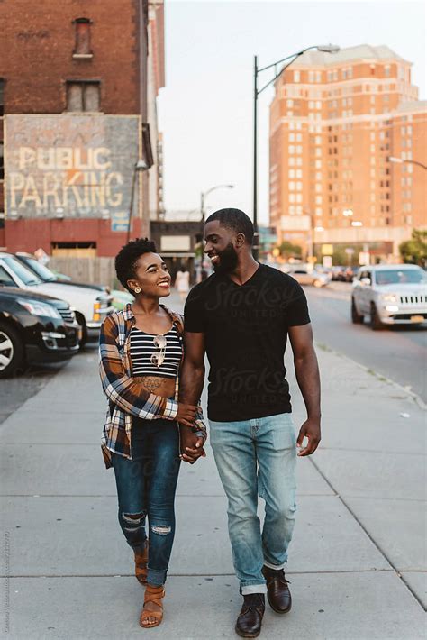 A Young Black Couple Walking Around The City At Sunset By Chelsea Victoria