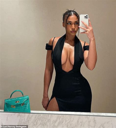 Lori Harvey Puts On A Very Busty Display In A Plunging Black Halter Dress Daily Mail Online