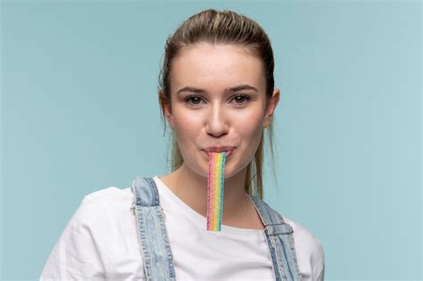 Free Photo Portrait Of Young Teenage Girl With Rainbow Candy
