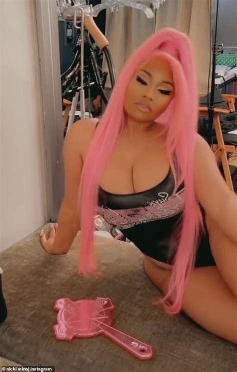 Nicki Minaj Rocks A Black Bodysuit While Posing In Front Of A Mirror As
