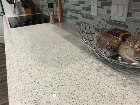 Cambria Whitney Quartz Counters With Gray Glass Backsplash Dinning