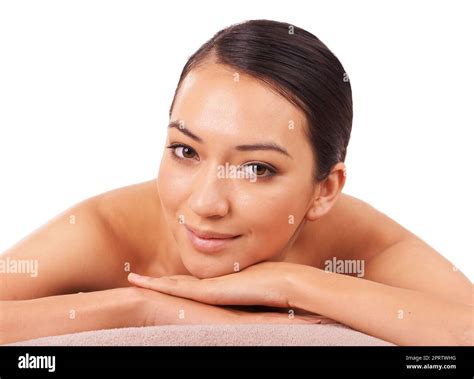 Take A Day Just For Yourself A Beautiful Young Woman Relaxing On A Massage Table Before Her