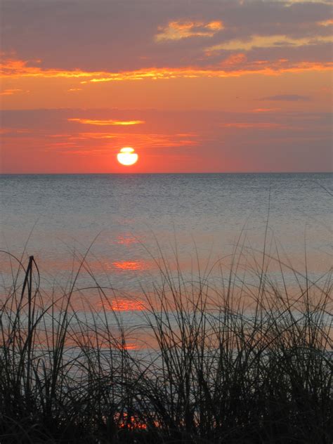 Watch the sunrise on the eastcoast of FL and the sunset on the gulf