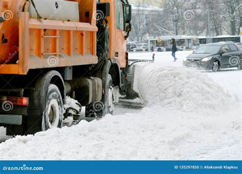Snow Removal Vehicles On The Streets Stock Photo Image Of Snowplough