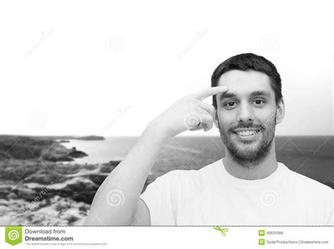 Smiling Young Handsome Man Pointing To Forehead Stock Image Image Of