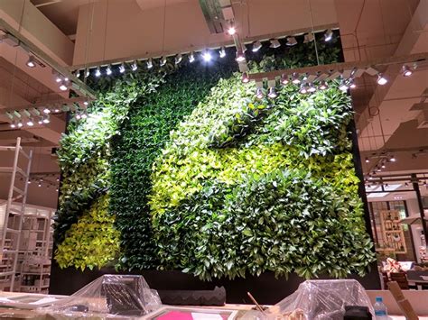 Gsky Adds Two Gorgeous Green Walls To West Elms New Store In Dubai