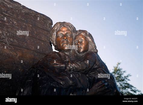 Detail Of A Mother Carrying Her Daughter Irish Famine Memorial Penns