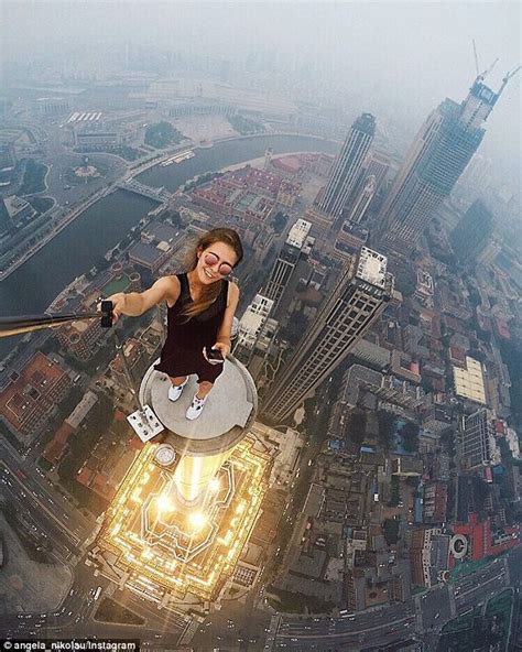 Angela Nikolau Performs Death Defying Yoga Poses On Top Of The Worlds