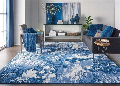This Blue And White Area Rug Looks Beautiful With The Matching Decor