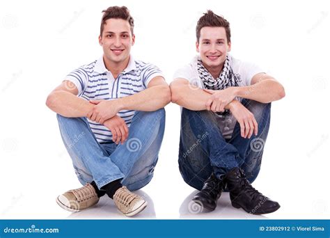 Two Friends Sitting Next To Each Other Stock Photo Image Of Caucasian