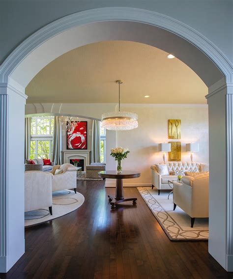 A Fabulous Arched Entryway Opens Up To A Living Space Featuring Our Chime Fixture Design By