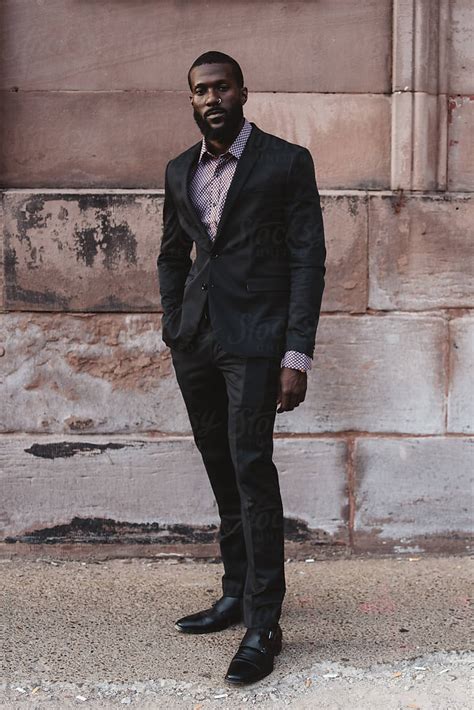 A Young Black Man In The City Wearing A Suit Del Colaborador De