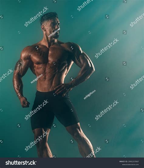 Strong Muscular Men Posing Flexing Muscles库存照片2091223567 Shutterstock
