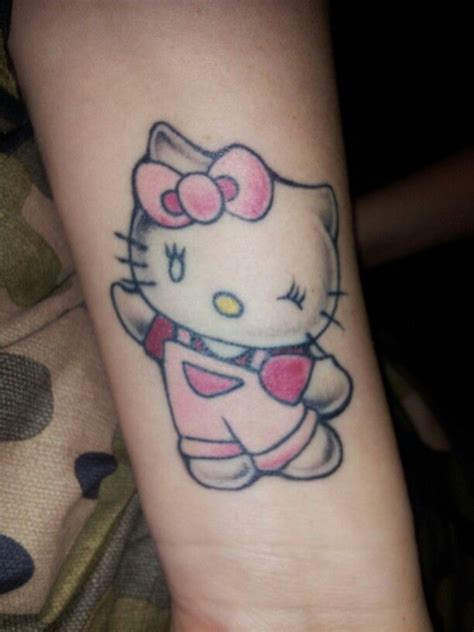 Whether one is a cancer survivor or just supporting someone they love, a tattoo in support of breast cancer awareness can be a gorgeous and strong way to wear the message. Hello Kitty Tattoo | Hello kitty tattoos, Tattoos, Cat tattoo