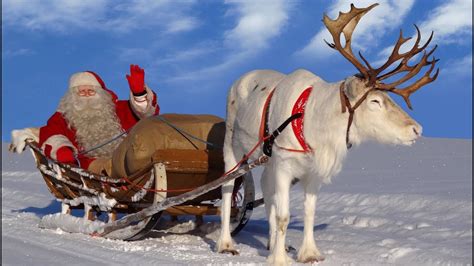 Foto Di Babbo Natale Con Le Renne