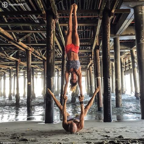 Theyre Head Over Heels Yoga Couple Pose In Gravity Defying Positions