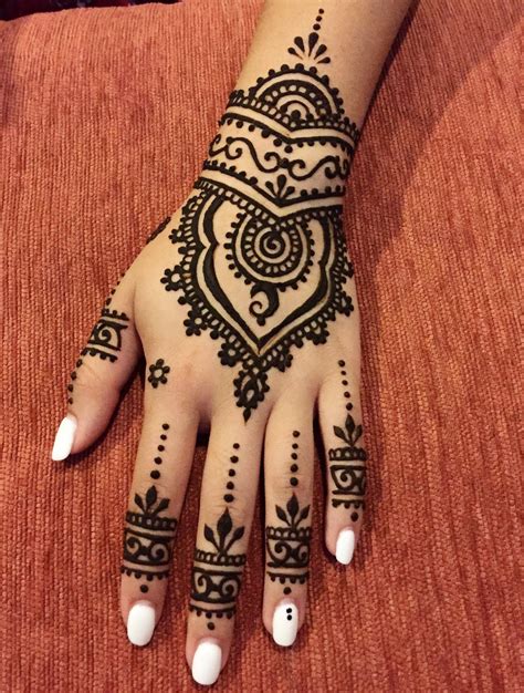 a henna tattoo on someone s hand