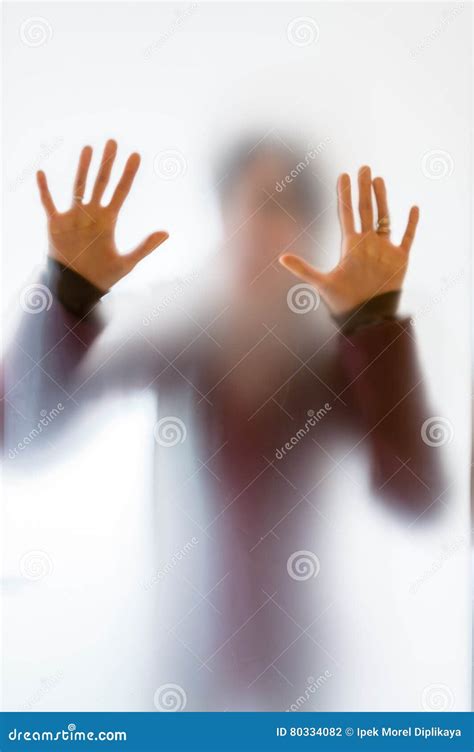 Shadowy Human Figure Behind A Frosted Glass Stock Photo Image Of