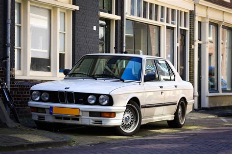 Equipped with straight 4 petrol (gasoline) engine with 2302 ccm capacity it produces 200 hp and 147. Some BMW E30 M5 lovers here? Found this beauty in Haarlem ...
